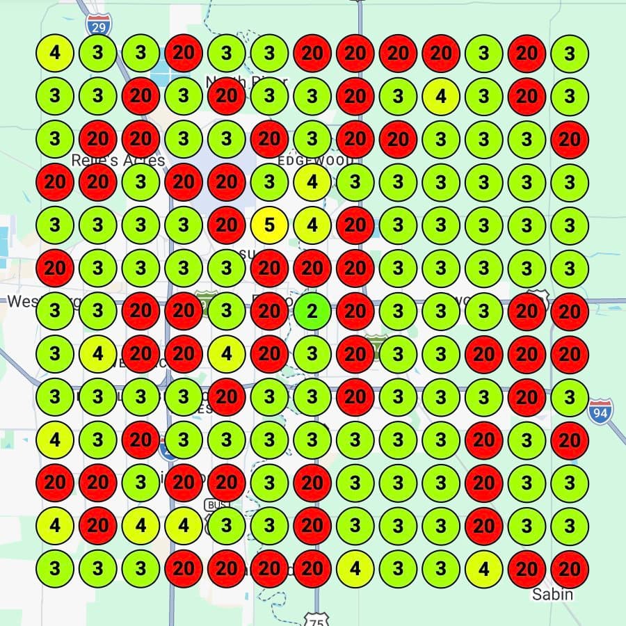 Geo-grid ranking map showing top 3 positions across the Fargo-Moorhead service area after 52 days of local SEO work